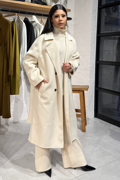 Ivory trench coat side pocket