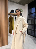 Ivory trench coat side pocket