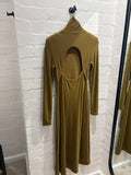 Green bodycon dress with cut out back