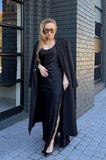 Black strappy satin dress with lace slit