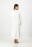 white linen blend top and skirt