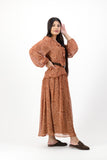 Rust ruffle dress with brown belt