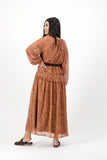 Rust ruffle dress with brown belt